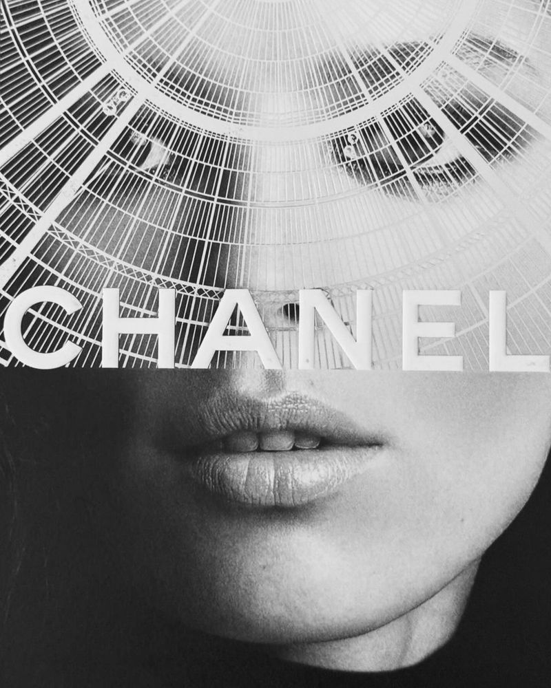 Black and white fashion shot of a woman's face partially obscured by an abstract dome-like structure with 'CHANEL' overlaid.