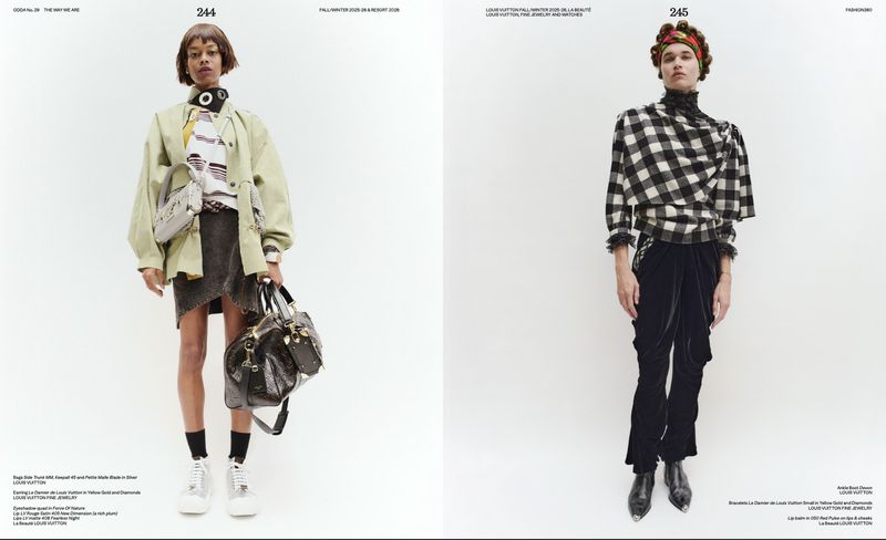 Two fashion models showcase Fall/Winter 2023-2024 Louis Vuitton in a minimalist studio with white backgrounds, full-length shot.