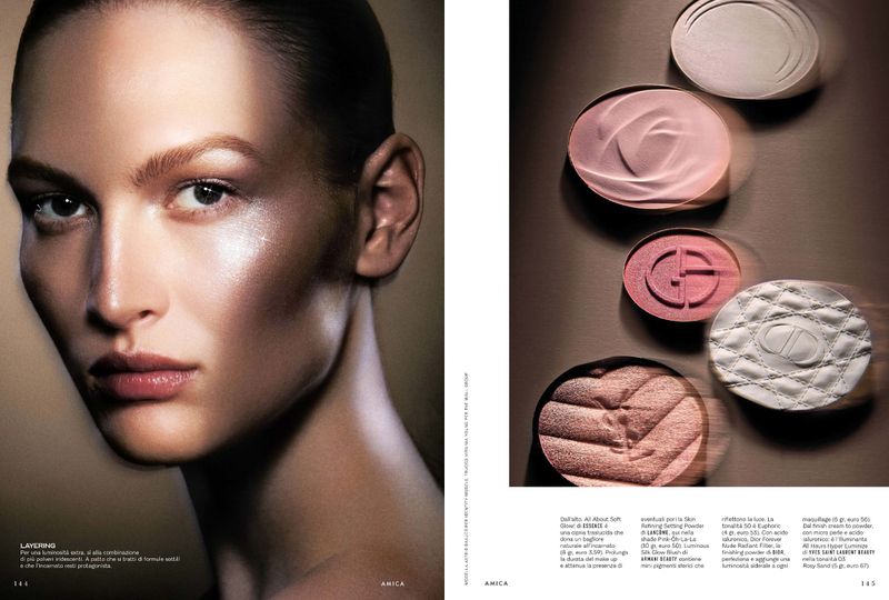 Close-up portrait of a woman with a beauty and cosmetics editorial layout featuring face makeup and beauty products, studio lit.