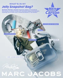 Marc Jacobs Jelly Snapshot Bag filled with personal items, accessories, and currency against a white background.