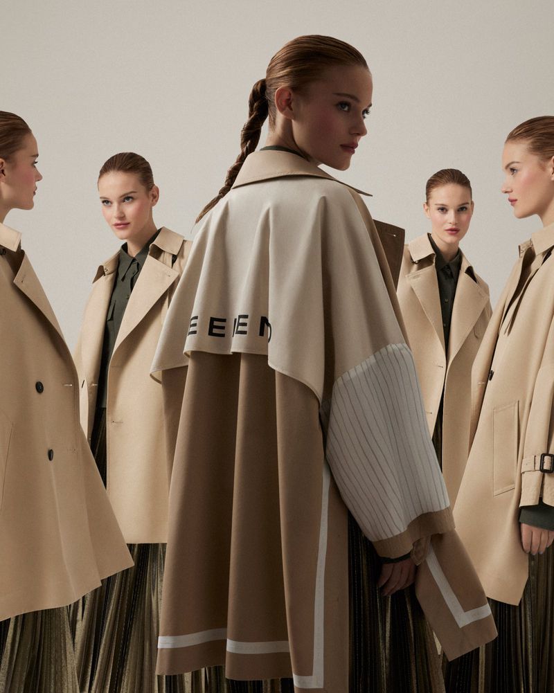 Fashion editorial featuring a woman wearing a tan trench coat with repeating models creating depth and showcasing the garment's design.