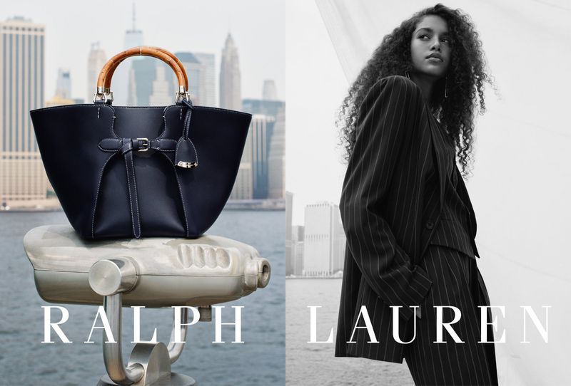 Ralph Lauren campaign featuring a handbag on a binocular viewer with a woman in a pinstripe suit against a cityscape backdrop.