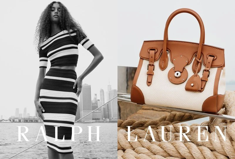 Fashion shot featuring a Black female model in striped knitwear and a tan leather handbag with a skyline and nautical ropes.
