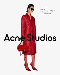 Model in a red leather coat and matching handbag wearing oversized sunglasses against a white background.