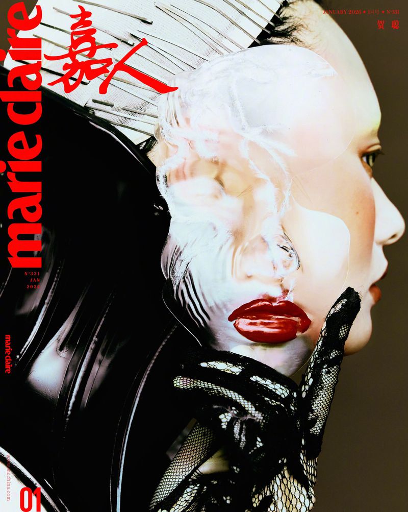 Marie Claire magazine cover featuring a woman in profile with glossy red lips and a hand raised to her face in a gesture.