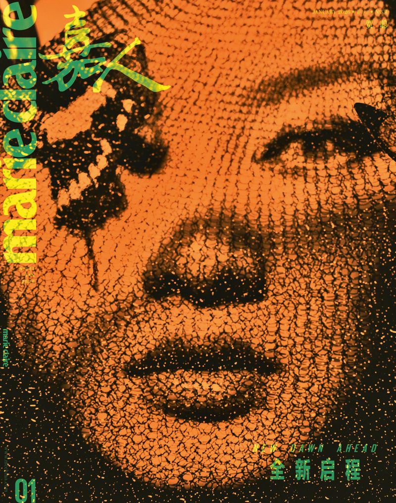 Artistic magazine cover featuring an abstracted face with an orange and black color scheme and geometric patterns overlaid on the portrait.
