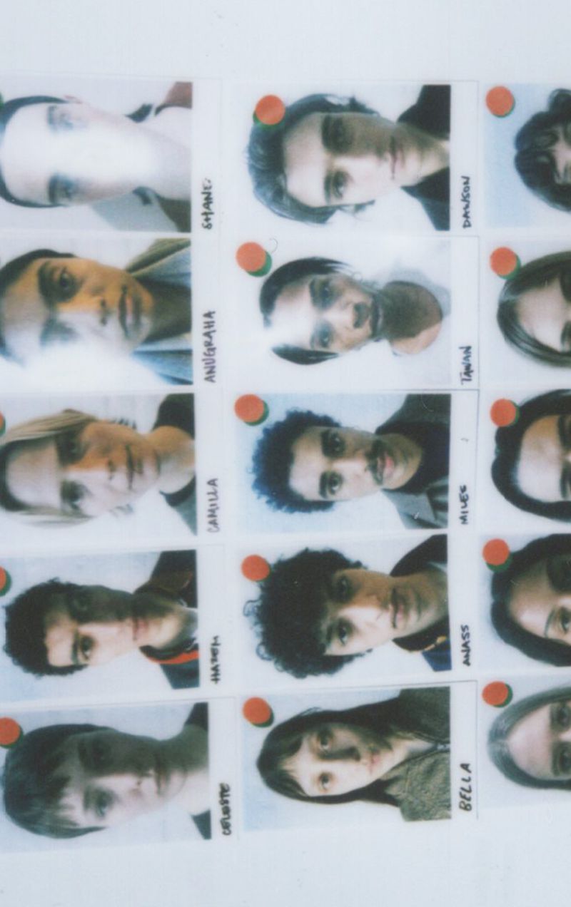 Collage of multiple Polaroid-style headshots of people with names below each image. The portraits are arranged in rows and columns.