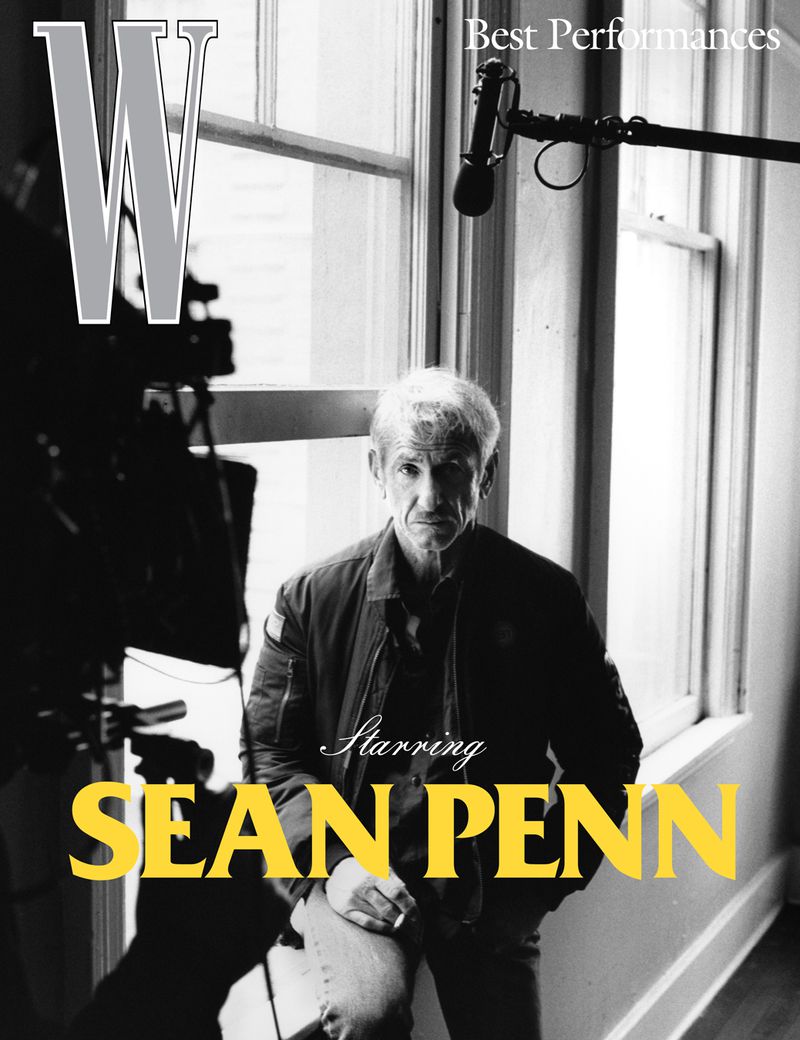 Black and white magazine cover featuring Sean Penn next to a large window with filming equipment and bright yellow text.