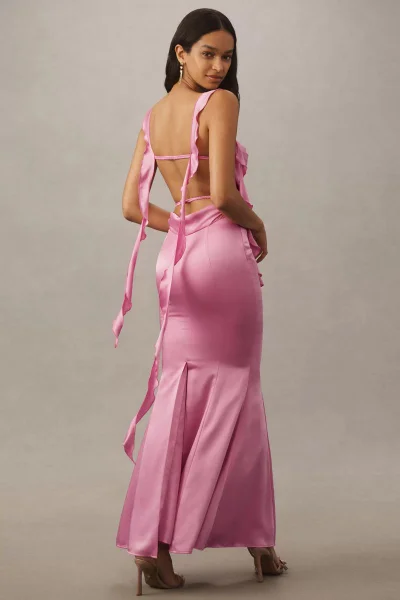 Model Franci Santos in a pink satin gown with ruffled straps for Anthropologie photographed by Kourosh Sotoodeh