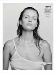Black and white portrait of model Marie-Louise Wedel in a white tank top with wet hair against a pale studio background.