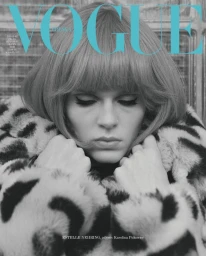 Model Estelle Nehring with a 1960s bob haircut and winged eyeliner wearing a plush leopard print coat on the Vogue Polska cover.