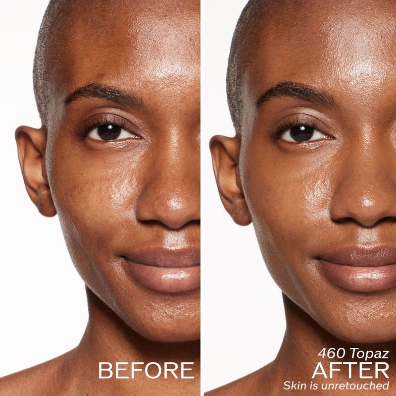 Before and after close-up of adult woman's face showing makeup application on right side, shot in bright photo studio on white.