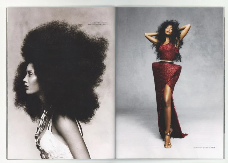 Magazine spread features two Black women in haute couture; one profile view with a large Afro, the other full length in a red gown.