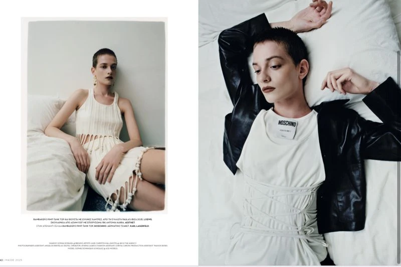 Two photos of the same female model on a white bed, with short hair. She wears a white dress in one and a leather jacket in the other.