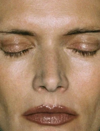 Close-up portrait of Malgosia Bela with closed eyes and glossy brown lipstick for Re-Edition Magazine
