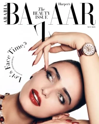 Model Samantha Saba poses with a luxury diamond wristwatch and glossy red lipstick for a Harper's Bazaar Arabia cover.
