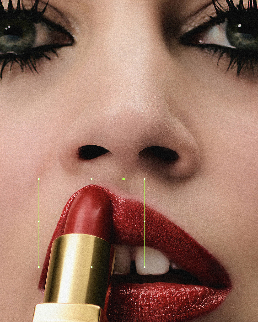 Extreme close-up portrait of a woman applying red lipstick with dramatic black eyeliner and heavy mascara.