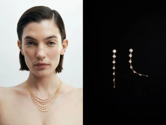 Close-up portrait of a woman wearing delicate gold layered necklaces and earrings from Fernando Jorge Parallel Collection.
