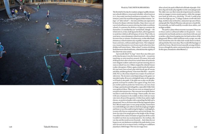 Children play soccer in a schoolyard in Japan, with a sparse background of buildings and a printed page on the right.