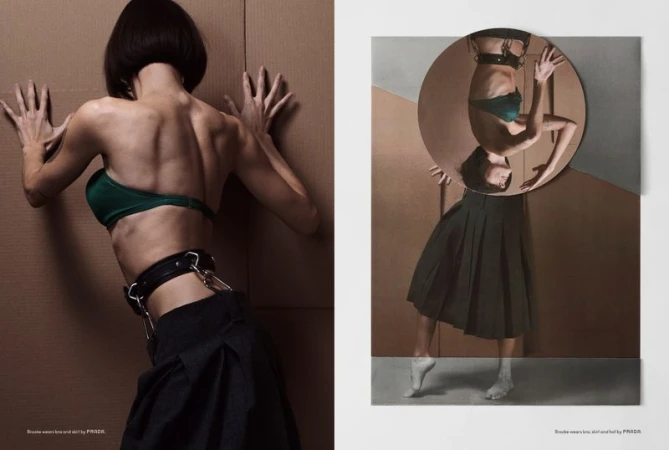 A woman in a green bra and black skirt is featured in a fashion photo; an upside-down mirror reflects the same outfit on a posterized surface.