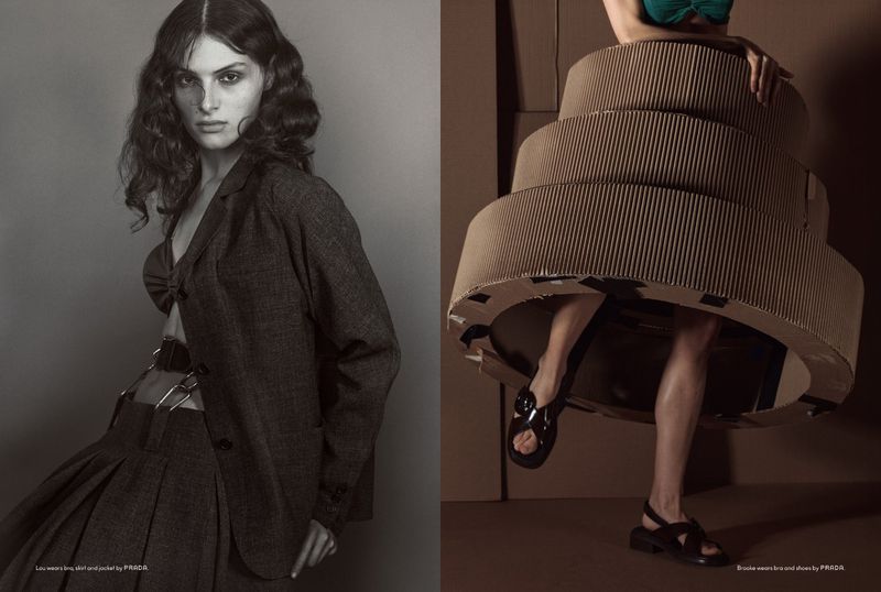 Monochrome fashion editorial featuring a woman in a blazer, skirt, and bra contrasted with a woman in a cardboard sculpture dress.