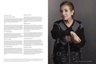 Elderly woman wearing an argyle sweater and patterned dark skirt leaning on a cane against a plain backdrop in a magazine spread.
