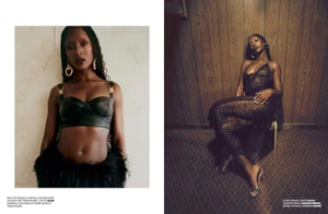 Jodie Turner-Smith poses in a black lace catsuit seated against wood paneling for Re-Edition Magazine photographed by Joshua Woods.
