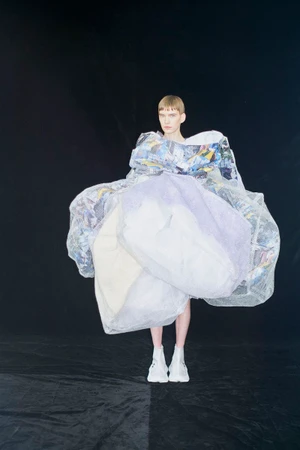 Model wearing an avant-garde voluminous sculptural garment by Comme Des Garçons for SSAW Magazine