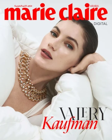 Magazine cover featuring Valery Kaufman wearing a gold necklace and a white puffy jacket, set against a light background, Marie Claire Arabia.