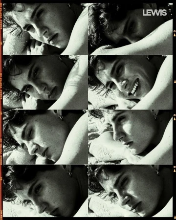 Black and white portrait of a young adult male lying on a beach in a grid of eight close-up frames with film roll borders.