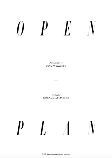 Fashion magazine cover featuring typography, 'Open Plan,' on a white background with photographer and stylist credits in simple black font.