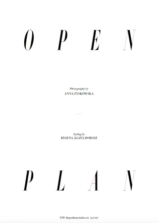 Fashion magazine cover featuring typography, 'Open Plan,' on a white background with photographer and stylist credits in simple black font.
