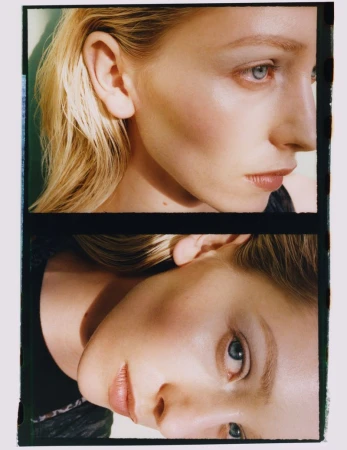 Close-up film portrait of a woman with blonde hair, blue eyes, and fair skin, split into two parts, against a light green backdrop.