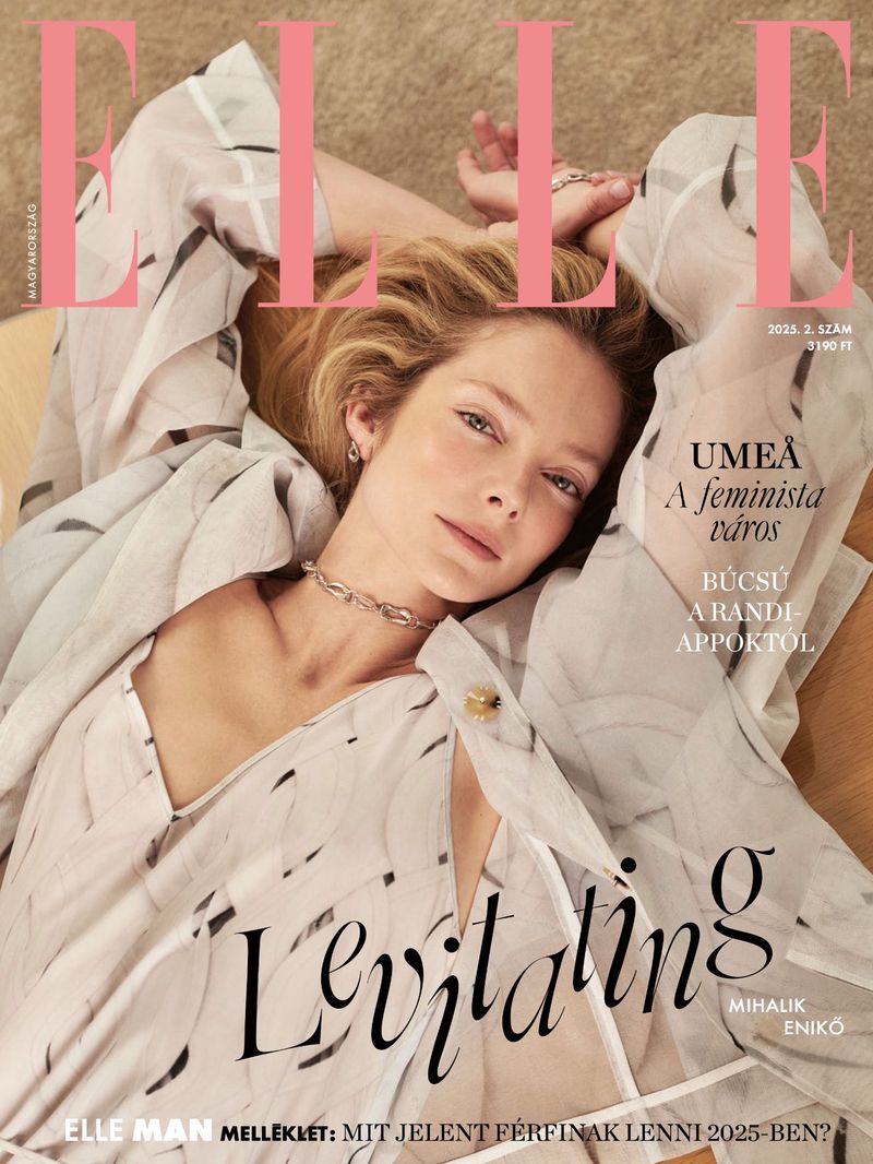 Elle magazine cover featuring a blonde woman in a patterned blouse lying on a beige surface, with magazine text overlaid.