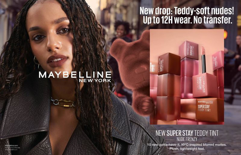 Maybelline ad features a model in leather jacket, showcasing lipstick with beauty products displayed in front of an urban background.
