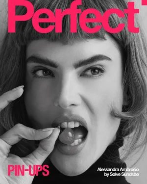 Close-up portrait of Alessandra Ambrosio biting a cherry for The Perfect Magazine pin ups project photographed by Sølve Sundsbø