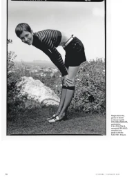 Model Lotte Kleihauer bending forward outdoors in a striped top and dark skirt, photographed by Federico Sorrentino for iO Donna.