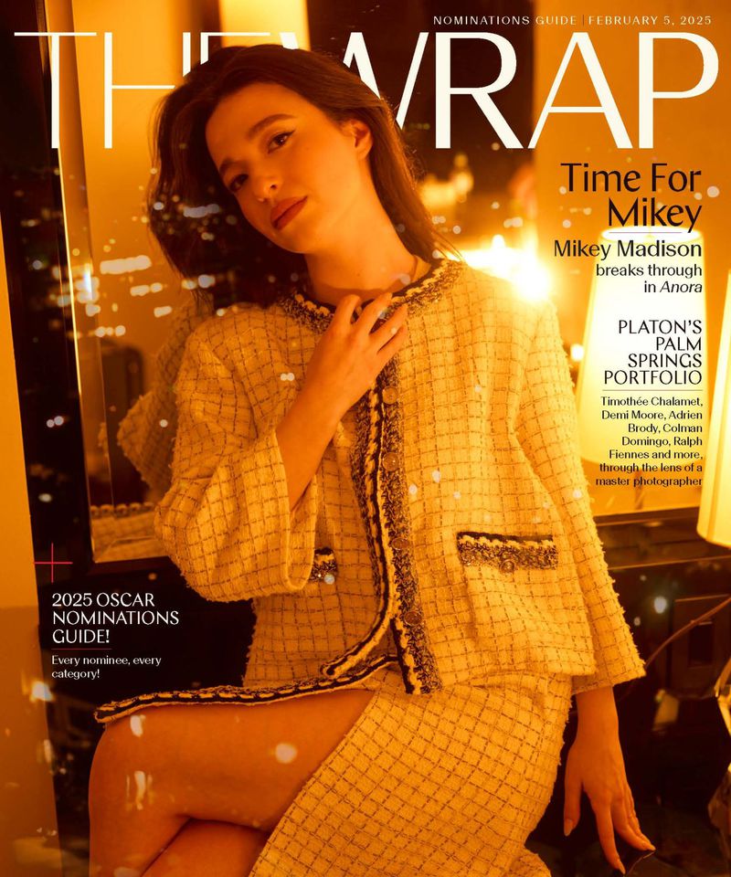 Magazine cover featuring a young woman in a tweed suit, promoting the 2025 Oscar nominations guide. The lighting is warm and diffused.