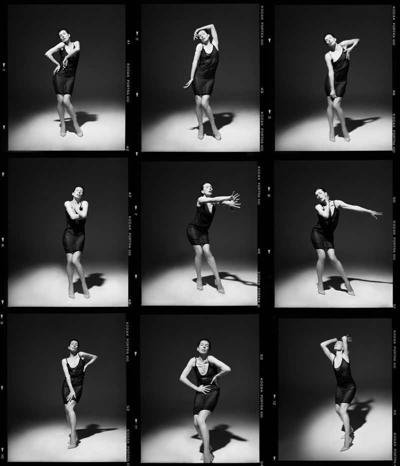 Black-and-white studio shot showcases a slender woman in a short dress, gracefully posing in multiple frames, highlighted by spotlighting.