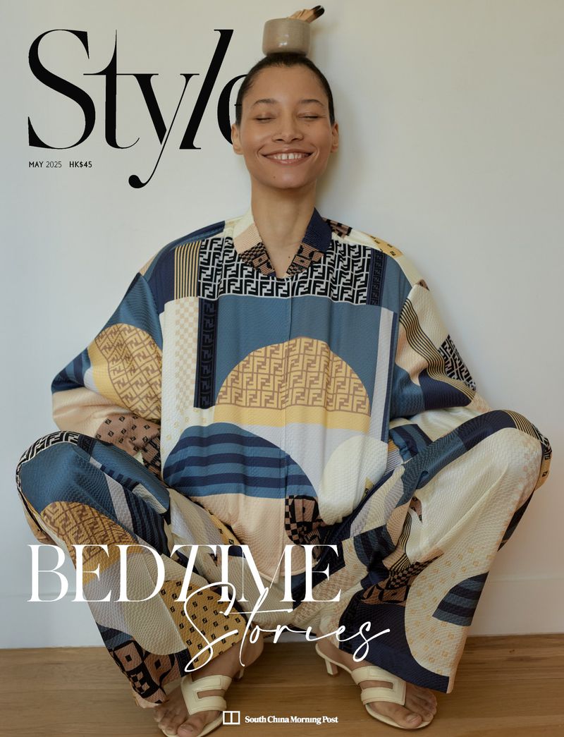 Magazine cover featuring a person in patterned pajamas, balancing a small pot on their head and smiling, with 'Style' and 'Bedtime Stories' text.
