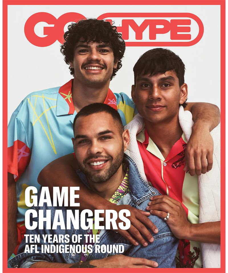 Magazine cover featuring three young adult males in colorful shirts, arms around each other, smiling, with 'GO HYPE' logo at the top.