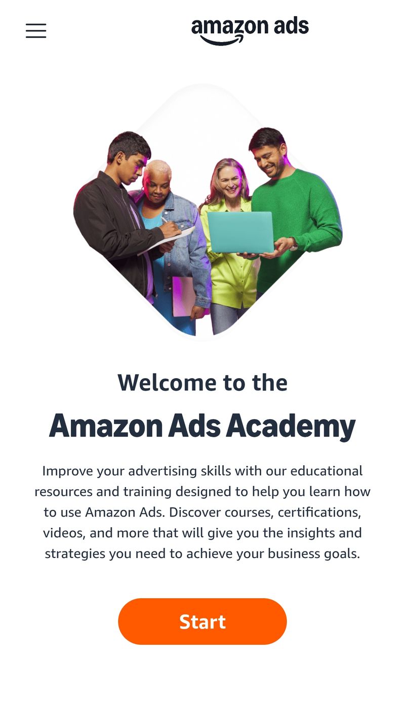 Amazon Ads Academy advertisement: Four diverse professionals collaborate using a laptop and notepad in a brightly lit, modern setting.