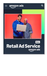 A man in a blue shirt and a person holding a laptop in front of a red backdrop for an Amazon GTE Ads campaign.