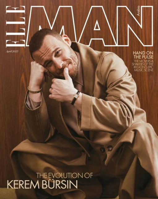 Magazine cover featuring Kerem Bursin in a beige suit, seated against a wood-paneled backdrop, Elle Man Arabia, April 2023 issue.