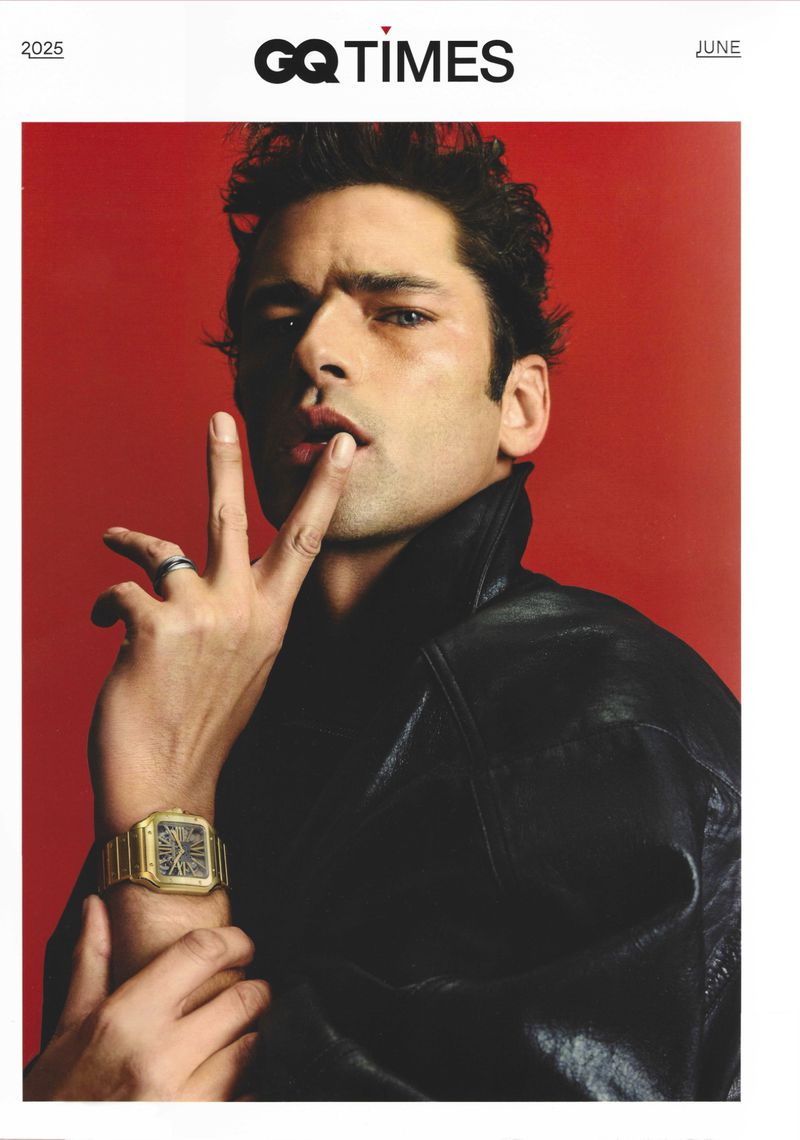 GQ Times magazine cover featuring a man in a black leather jacket against a red background, wearing a gold watch and ring.
