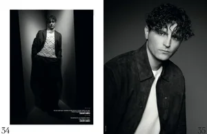 Black and white editorial portrait of French actor Raphael Quenard wearing a dark jacket and white t-shirt