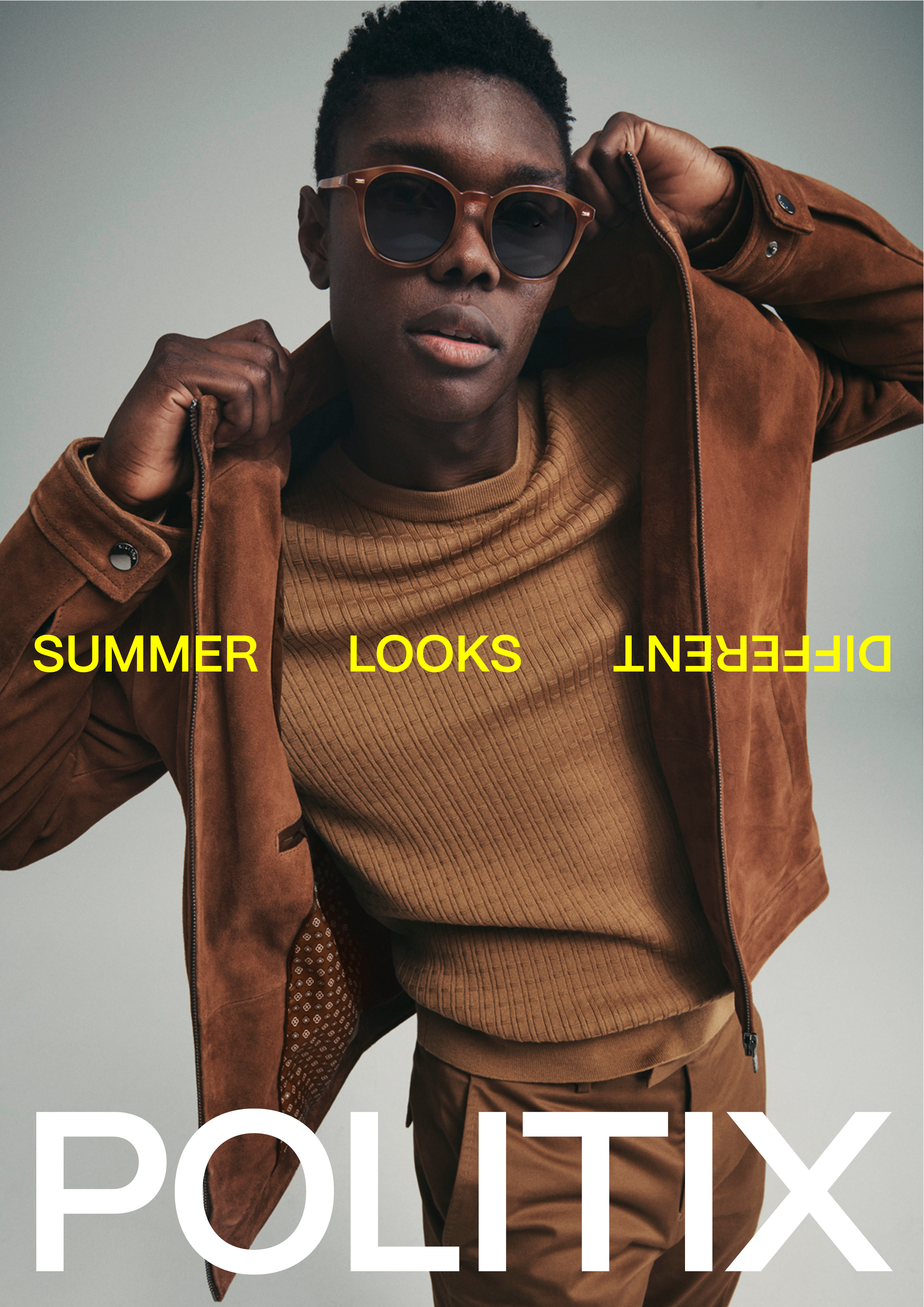 An adult male model poses indoors wearing a brown suede jacket, tan sweater, and sunglasses, styled for a Politix fashion advertisement.