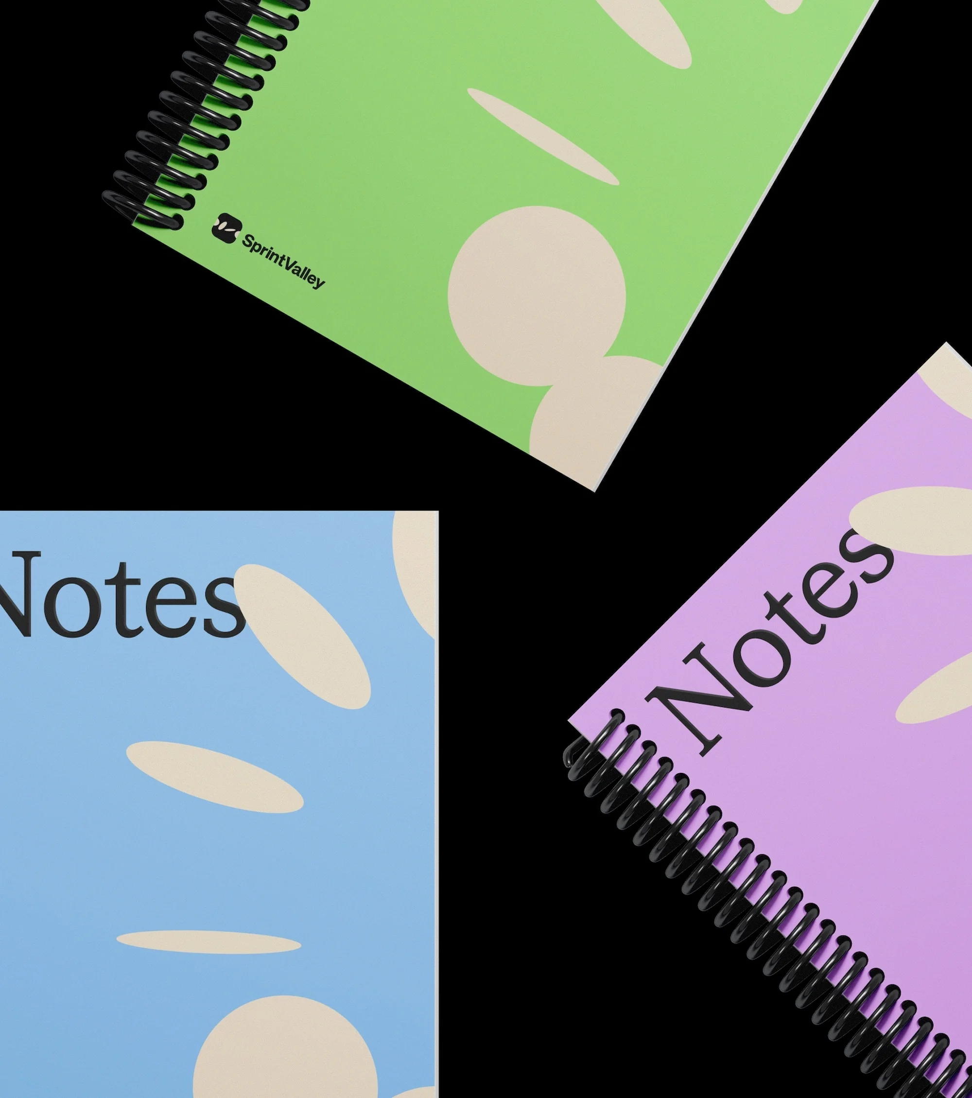 Three spiral notebooks in light blue, green, and purple with abstract designs and the SprintValley logo on a solid black background.
