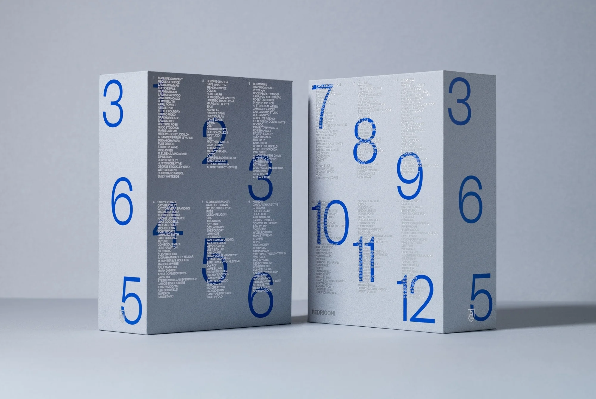 Two white books with blue text and numbers, styled in a clean and simple composition on a light background. Cover design focus.
