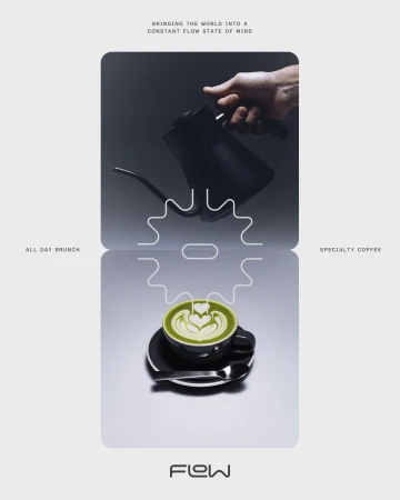 Pouring matcha latte into a black cup with a spoon on a reflective surface in a studio, creating a visually appealing advertisement.